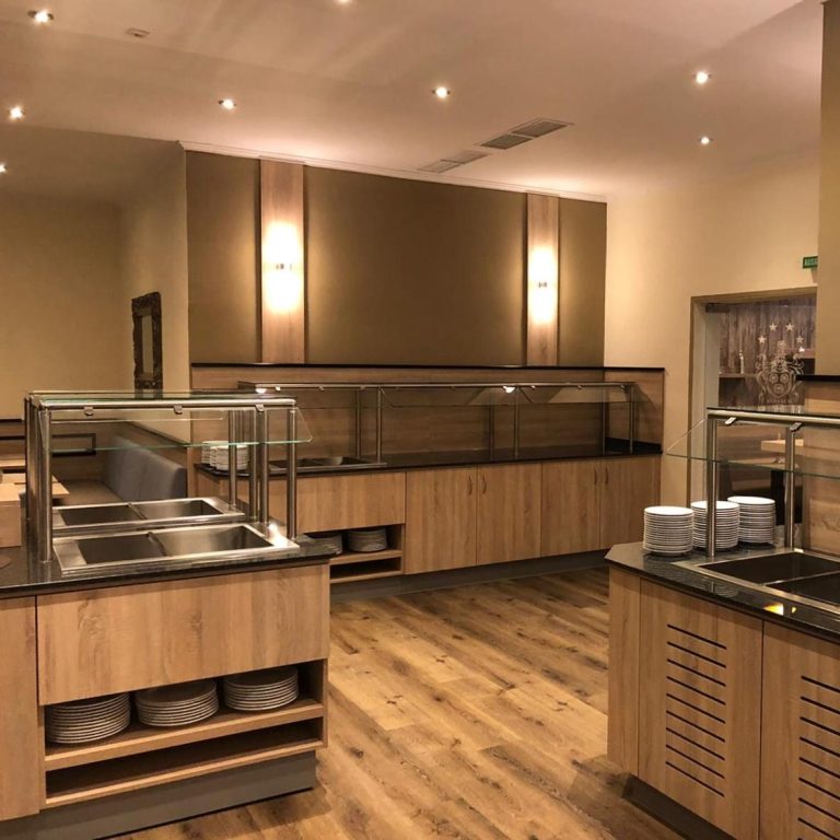 Schön beleuchtete Buffettheke / Thekenbau, Restauranteinrichtung,Gaststätteneinrichtung, Bistroeinrichtung, Caféeinrichtung 